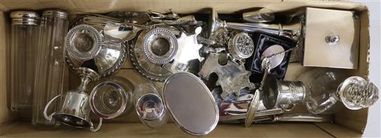 A quantity of assorted silver items including miniature dogs, dwarf candlesticks, toilet jars etc.